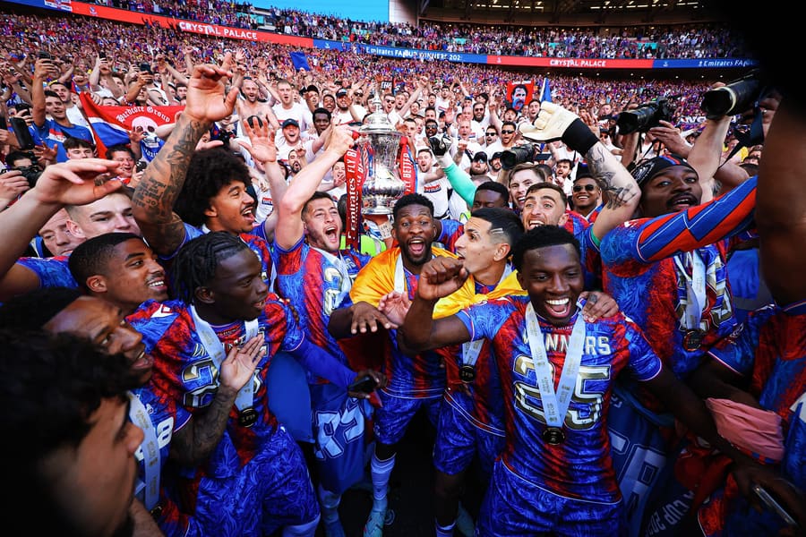 Joel Ward of Crystal Palace lifts the FA Cup at Wembley, 2025