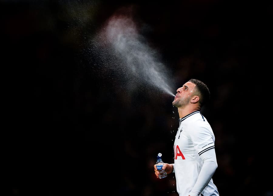 Kyle Walker of Tottenham Hotspur sprays water, Arsenal v Tottenham, FA Cup 2014